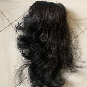 Black hair extension. Great for a beautiful, long ponytail.